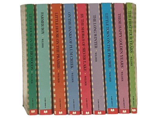The Complete Set of Laura Ingalls Wilder's Little House Books, in Nine Volumes: Little House in the Big Woods; Farmer Boy; Little House on the Prairie; On the Banks of Plum Creek; By the Shores of Silver Lake; The Long Winter; Little Town on the Prairie;…
