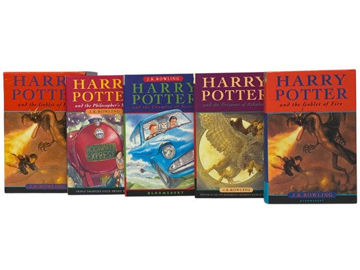 Harry Potter Complete Four Volume Set: Harry Potter and the Sorcerer's Stone; Harry Potter and the Chamber of Secrets; Harry Potter and the Prisoner of Azkaban; Harry Potter and the Goblet of Fire