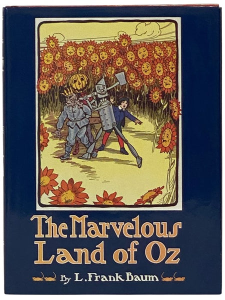 The Marvelous Land of Oz: Being an Account of the Further Adventures of the Scarecrow and Tin Woodman, and Also the Strange Experiences of the Highly Magnified Woggle-Bug, Jack Pumpkinhead, the Animated Saw-Horse and the Gump; the Story Being a Sequel to…