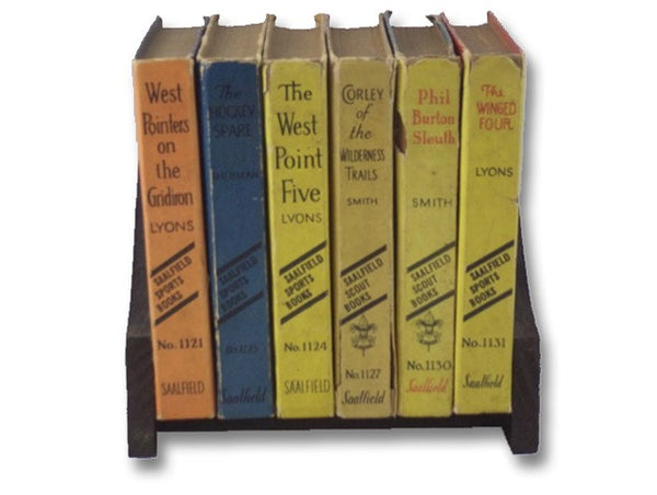 Six Volume Saalfield Boys' Adventure and Sports Series Set with Book Stand: West Pointers on the Gridiron; The West Point Five; The Hockey Spare; Corley of the Wilderness Trails; Phil Burton Sleuth; The Winged Four (Saalfield 1121, 1124, 1125, 1127, 1130…