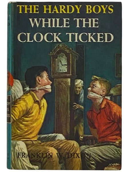 While the Clock Ticked (The Hardy Boys Mystery Stories, Book 11)